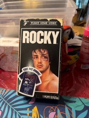 Funko Home Video set features a Rocky branded t-shirt packaged inside a box desi